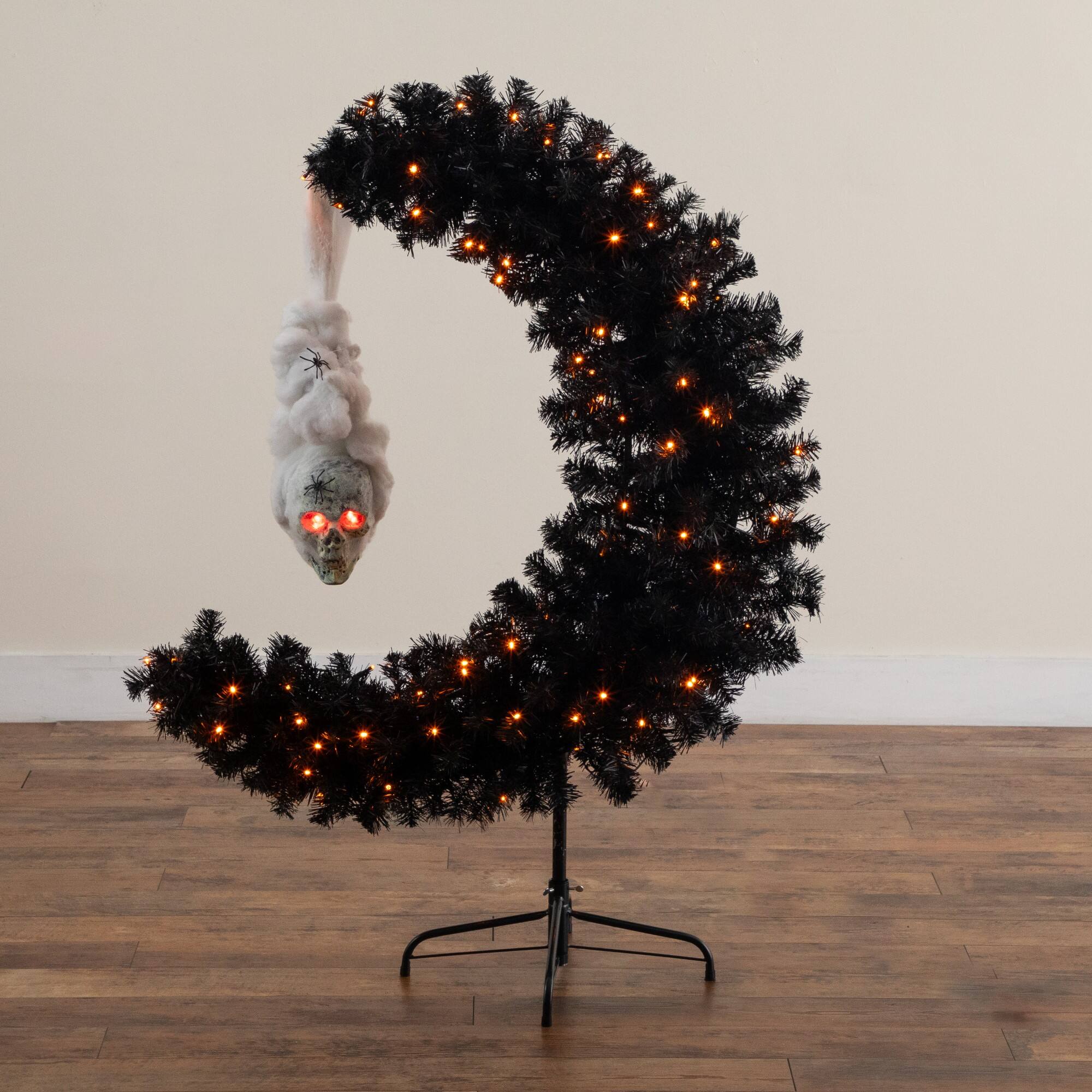 4ft. Pre-Lit Artificial Halloween Black Moon & Skull Tree with 250 Orange & Purple LED Lights